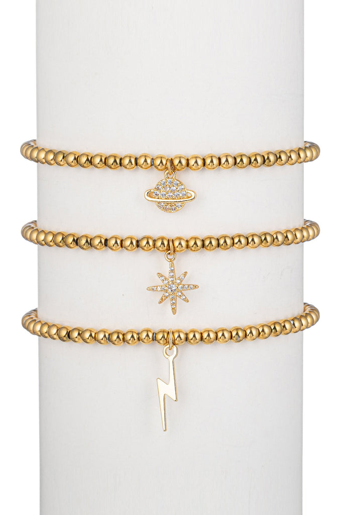 Saturn, star and lightning bolt pendant bracelet set studded with CZ crystals.