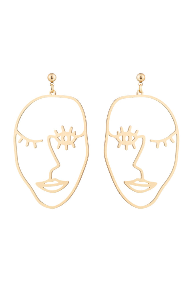 Gold brass face design drop earrings.