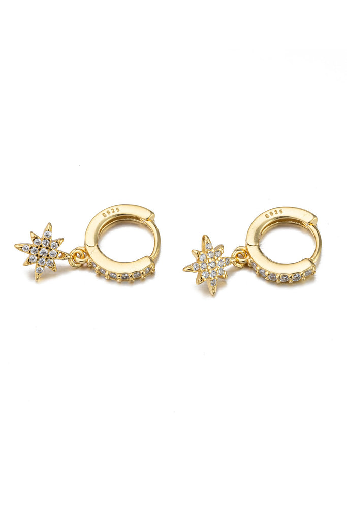 North Star gold tone sterling silver huggie earrings.