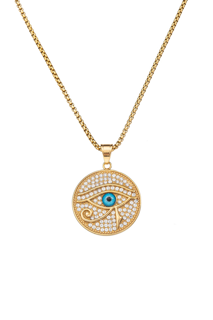 Gold tone titanium circle eye pendant necklace studded with CZ crystals.
