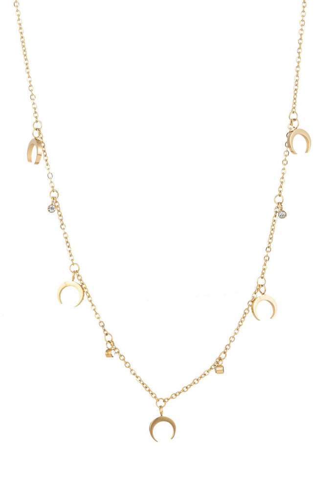 Gold tone brass necklace with brass charms.