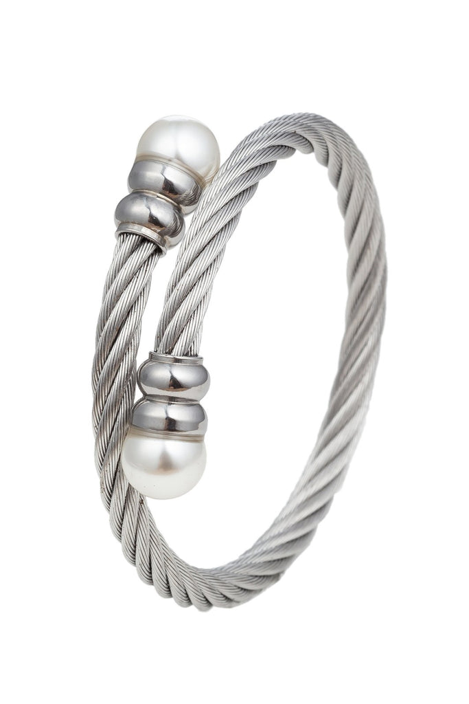 Silver wire titanium wrap cuff bracelet with glass pearls. 