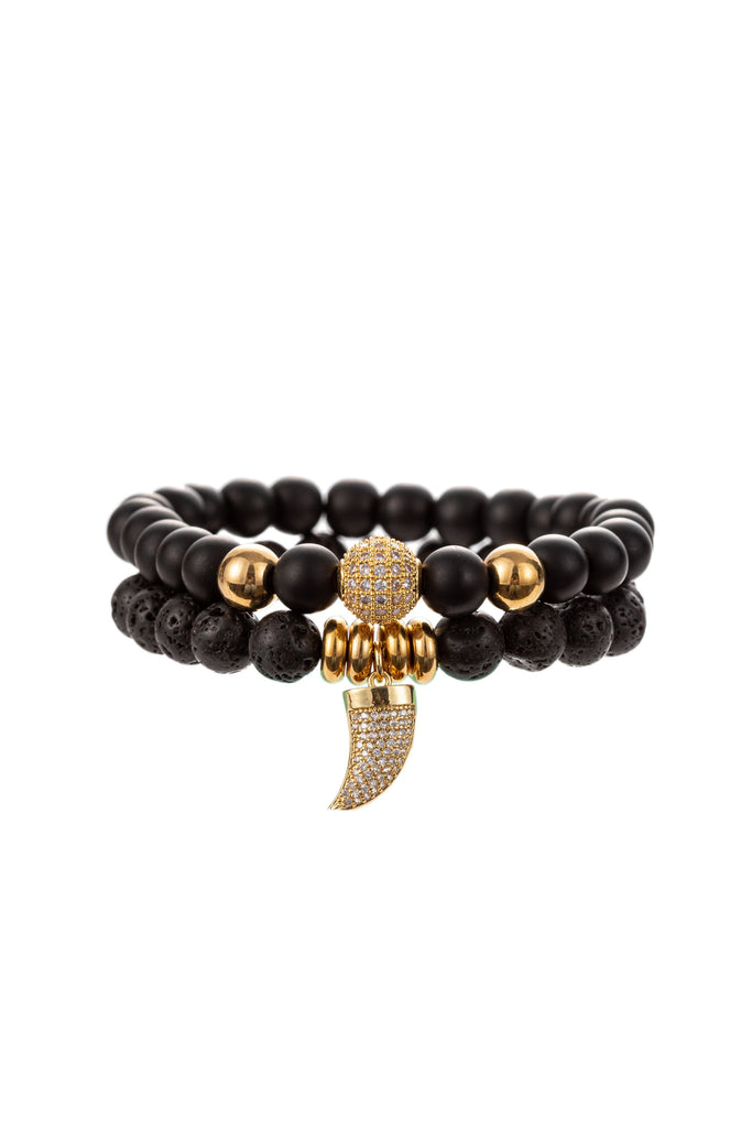 Agate beaded bracelet set with a brass CZ crystal horn charm.