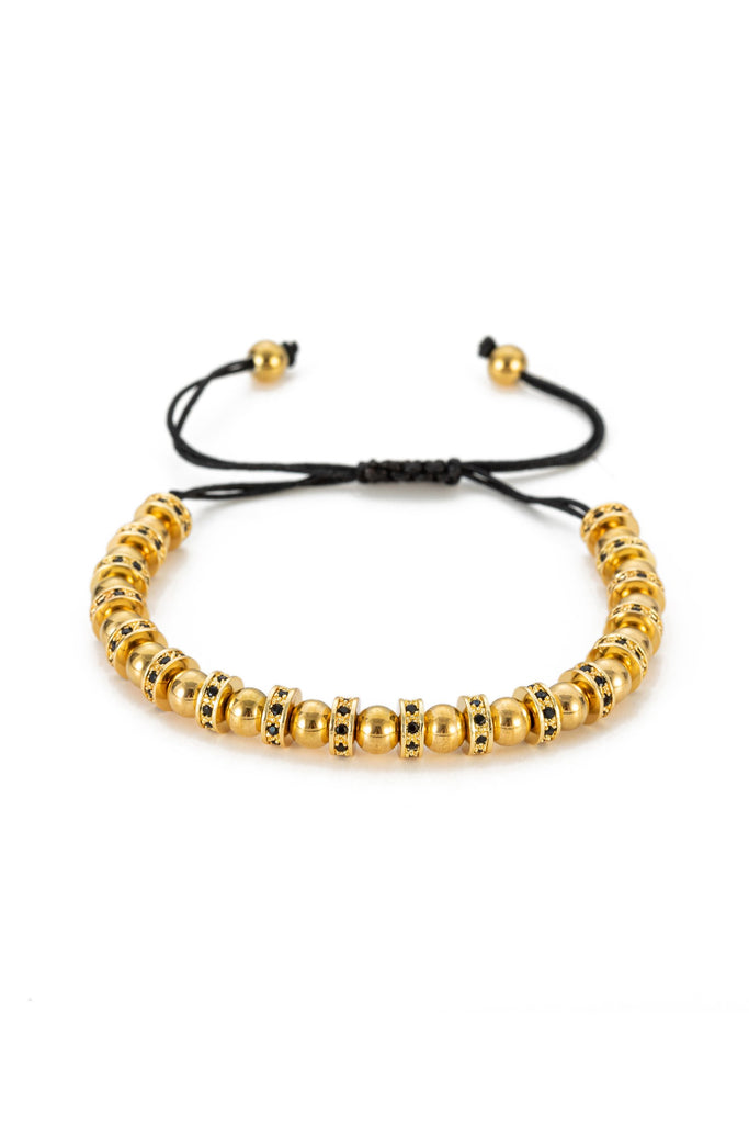 Gold titanium beaded bracelet.